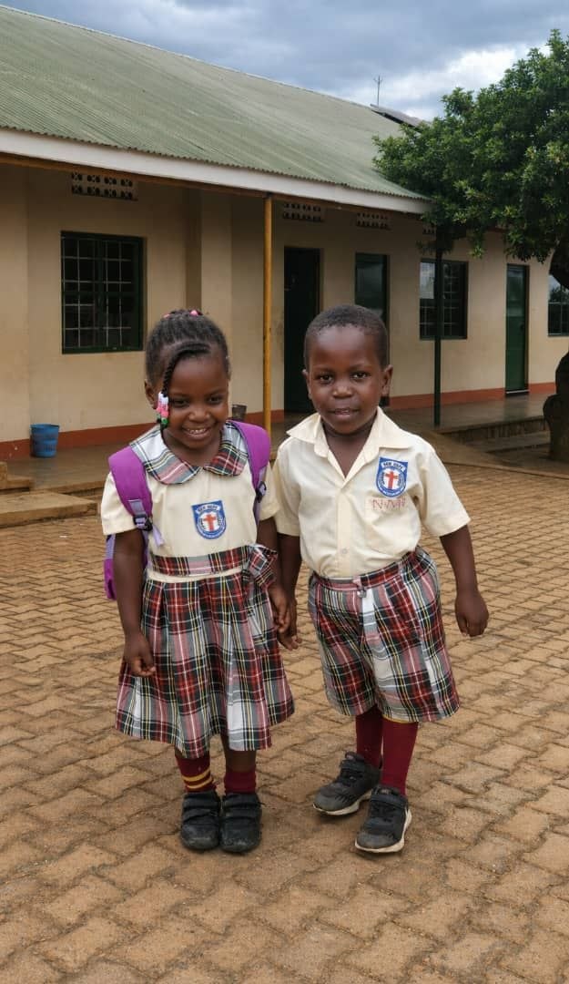 Happy students at New Hope Primary School - The Joy of Learning